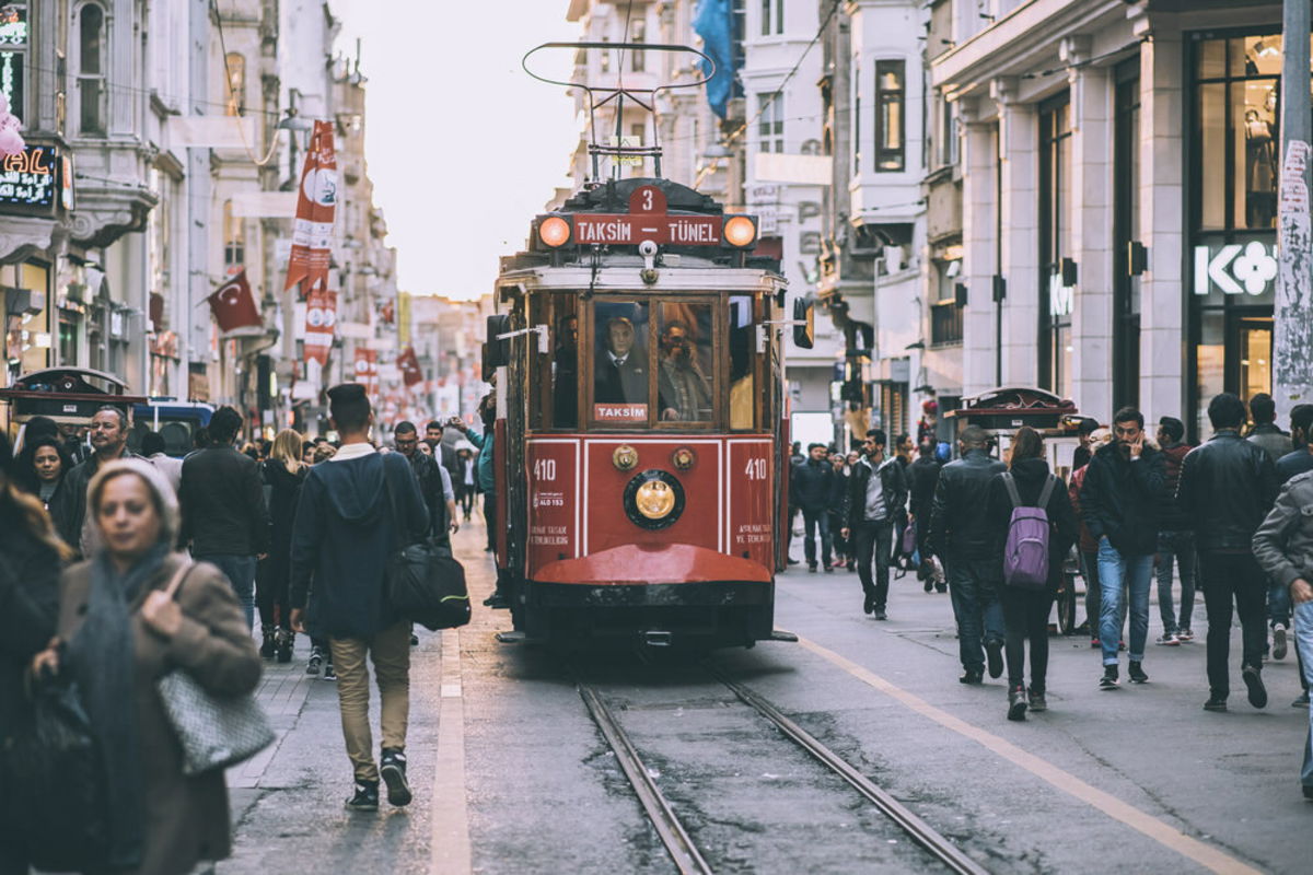 Couple laughing on a tram-track street in Karaköy